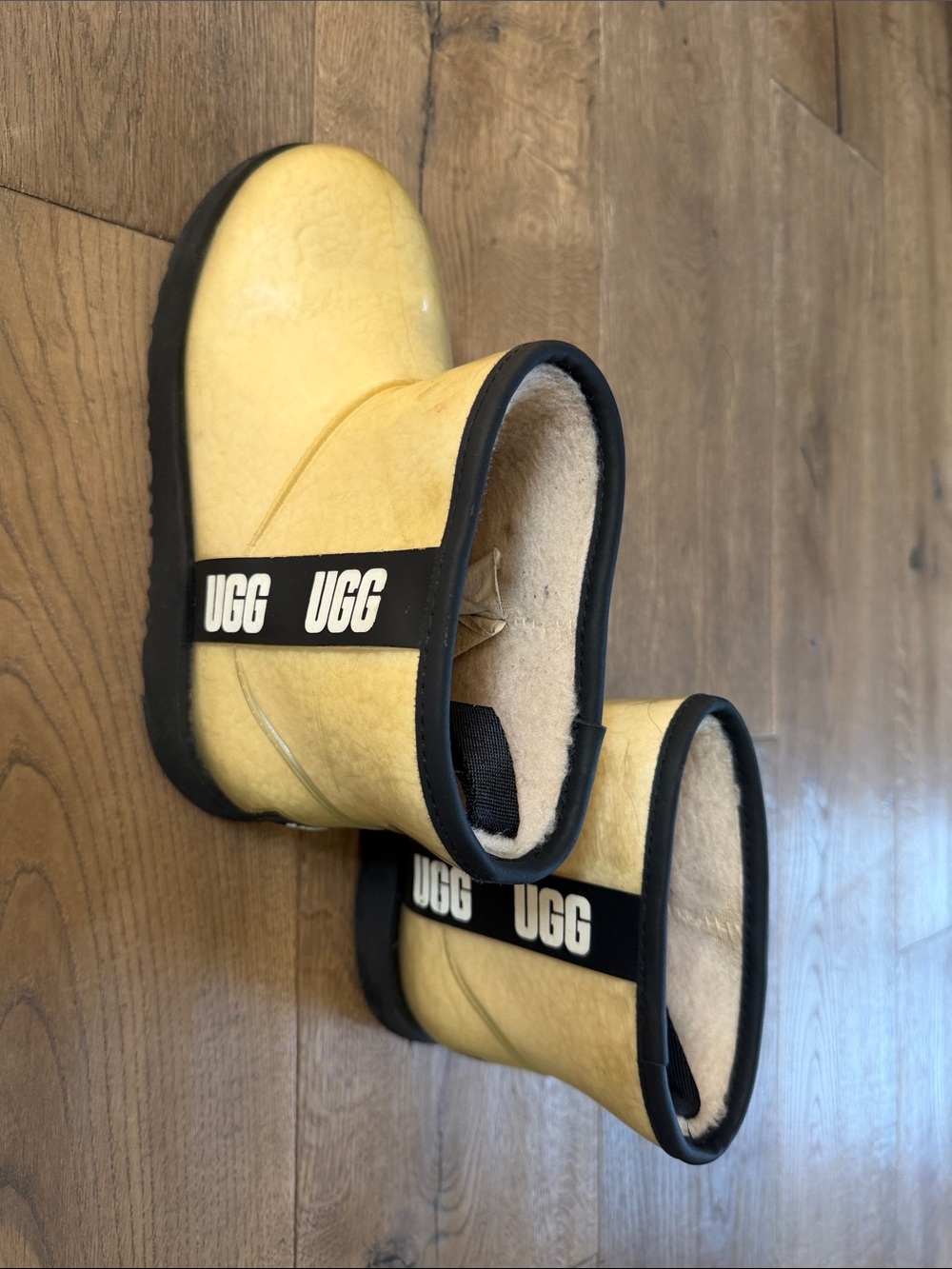 UGG Kids Yellow Slip-On Shearling Boots with Black Trim